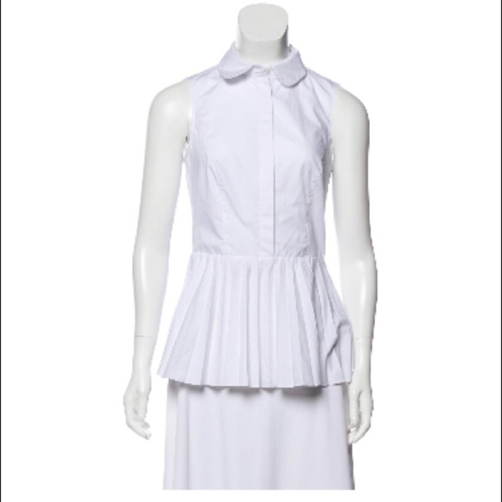 Karen Millen sleeveless peplum top, runs small